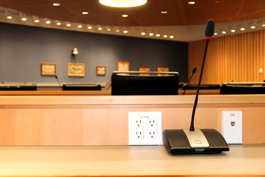 Acoustic panels on walls of a compact home office space